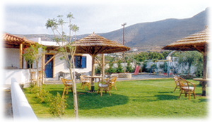 beautiful  garden and a traditionally built bar - Filoxenia Studio - Agios Petros Beach - Andros - Cyclades Islands - Greece